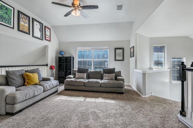 carpeted living room with vaulted ceiling and ceiling fan