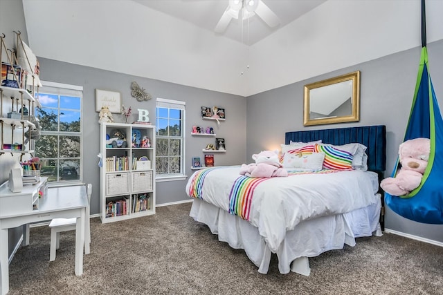 carpeted bedroom featuring ceiling fan and multiple windows