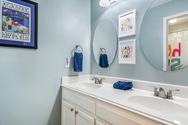 bathroom featuring vanity