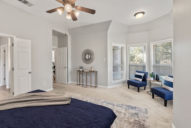 bedroom featuring light carpet and ceiling fan