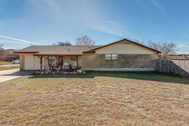 single story home with a front yard, a garage, and a porch