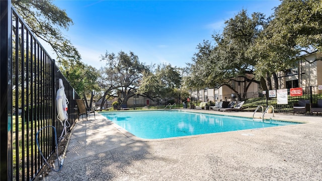 view of pool with a patio