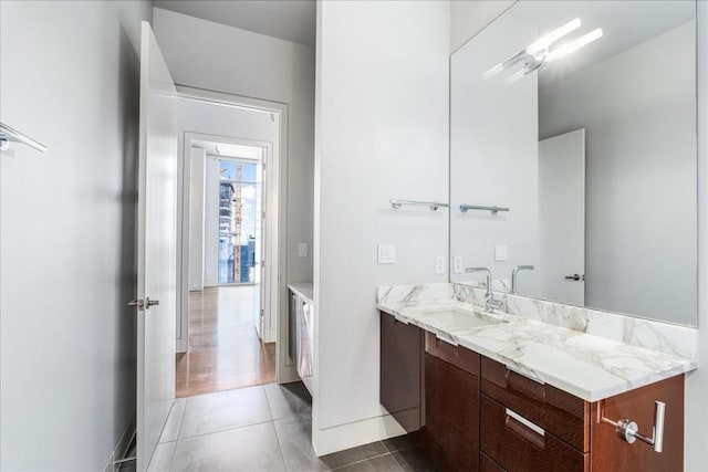 360 Nueces St Unit 4305, Austin, TX 78701 - bathroom with vanity, tile patterned floors, and baseboards