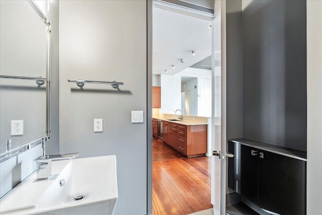 bathroom with vanity and hardwood / wood-style flooring