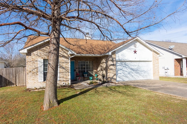 ranch-style house featuring a front yard and a garage