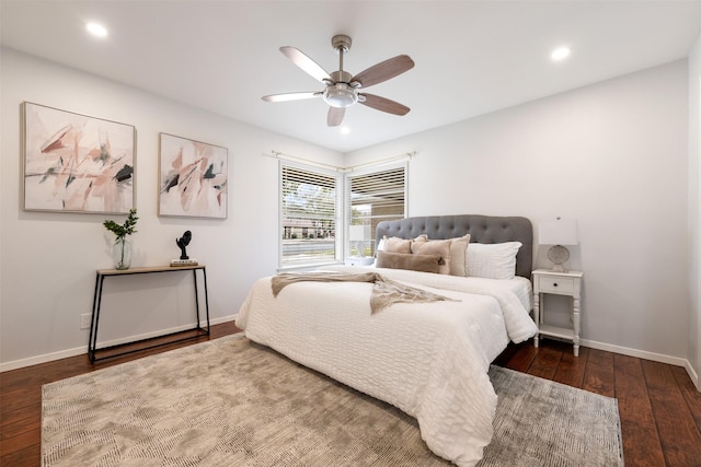 bedroom featuring ceiling fan and dark hardwood / wood-style flooring