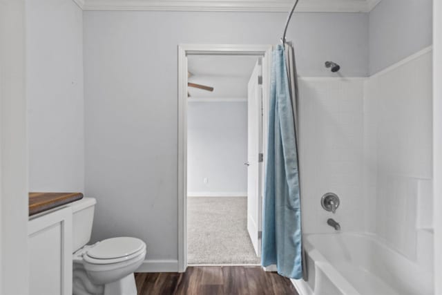 full bathroom featuring wood-type flooring, shower / bath combo, and ornamental molding