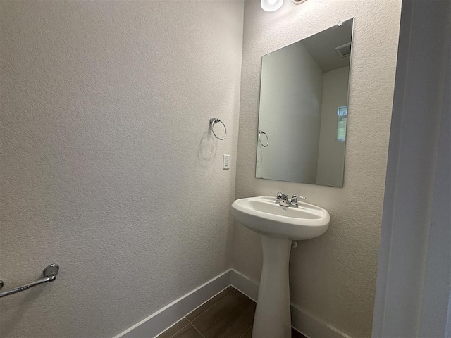 bathroom featuring sink and tile patterned floors