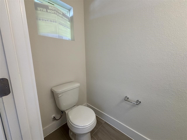 bathroom featuring toilet