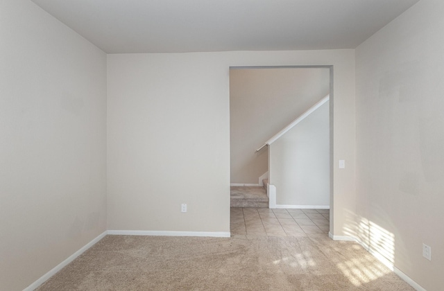 unfurnished room with carpet flooring