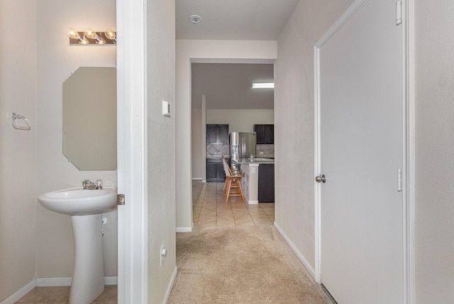 bathroom with tile patterned floors