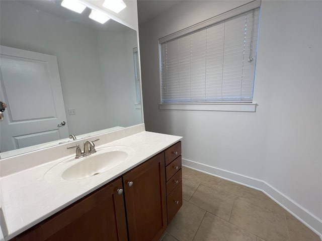 bathroom with vanity and tile patterned floors