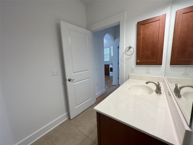 bathroom featuring vanity and tile patterned flooring