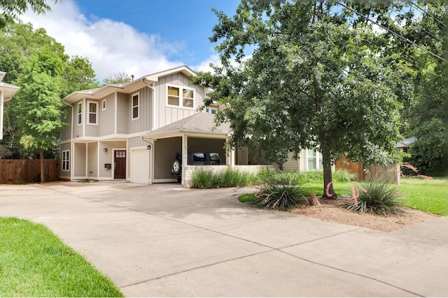 view of front of property featuring a garage