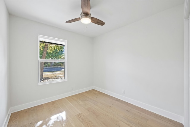 unfurnished room with light hardwood / wood-style floors and ceiling fan