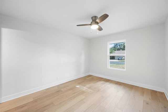 unfurnished room with ceiling fan and light hardwood / wood-style flooring