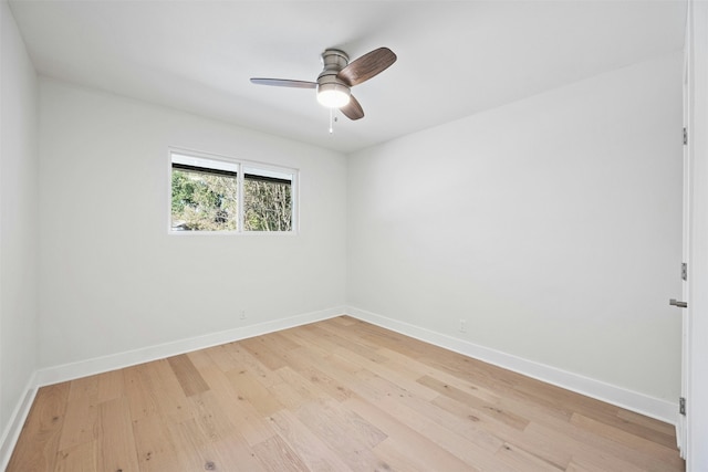 unfurnished room featuring ceiling fan and light wood-type flooring