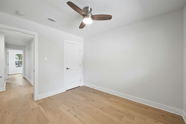 unfurnished room featuring ceiling fan and light hardwood / wood-style floors