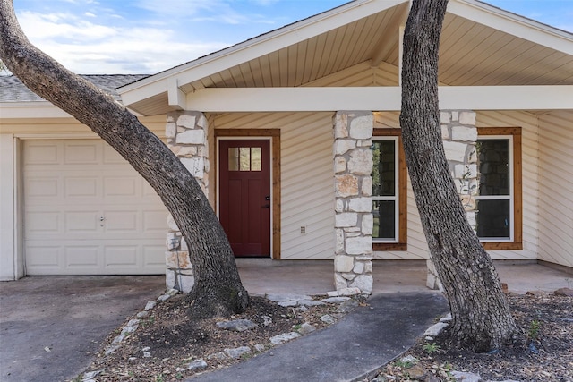 entrance to property featuring a garage