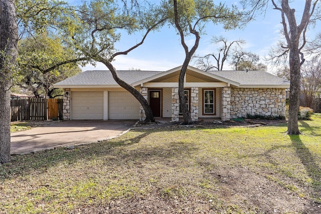 single story home featuring a front yard and a garage