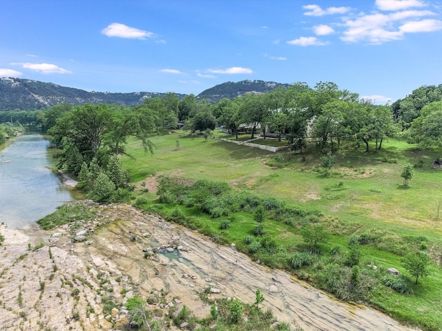 property view of mountains featuring a water view and a rural view