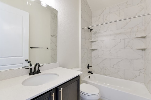 full bath with vanity, toilet, a textured wall, and shower / bathtub combination