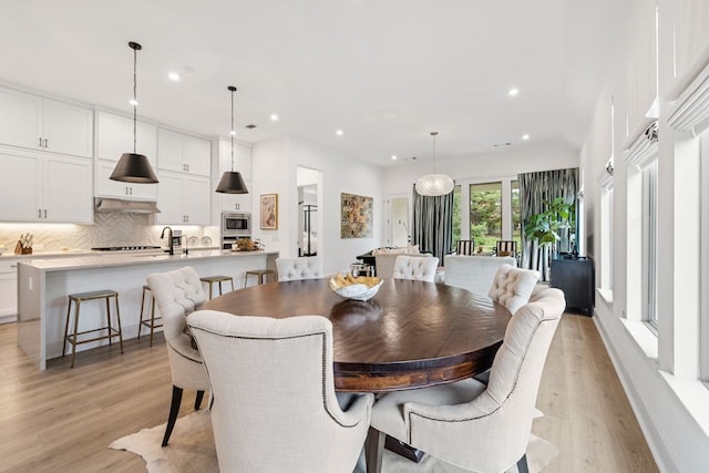 dining space featuring light hardwood / wood-style flooring