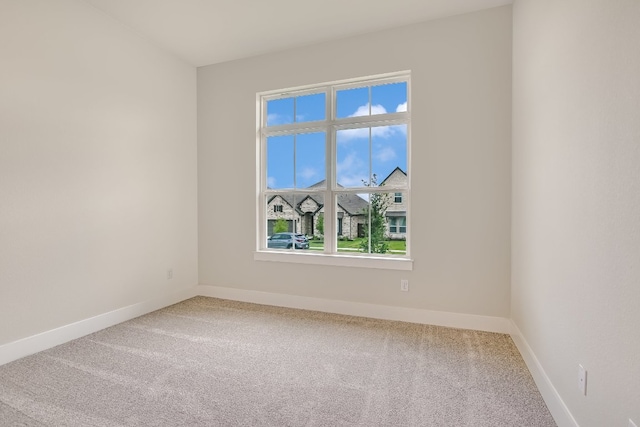 8412 Bouvreuil Dr, Austin, TX 78738 - carpeted spare room featuring baseboards