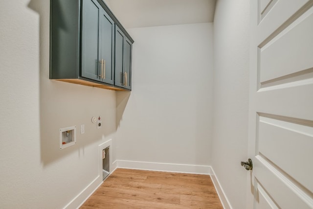 8412 Bouvreuil Dr, Austin, TX 78738 - laundry area with cabinet space, washer hookup, light wood-style flooring, hookup for an electric dryer, and gas dryer hookup