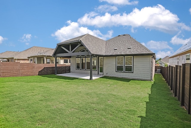 8412 Bouvreuil Dr, Austin, TX 78738 - back of house featuring a patio area and a shingled roof