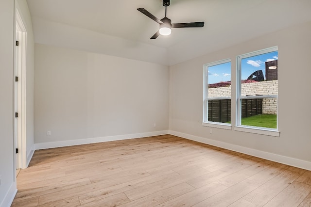 8412 Bouvreuil Dr, Austin, TX 78738 - unfurnished room with light wood finished floors, a ceiling fan, and baseboards