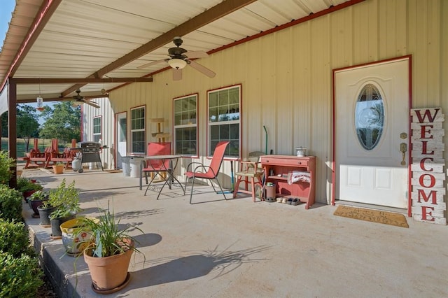 view of patio / terrace with ceiling fan and area for grilling