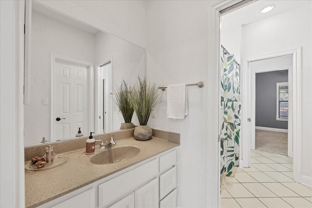 bathroom featuring tile patterned floors and vanity