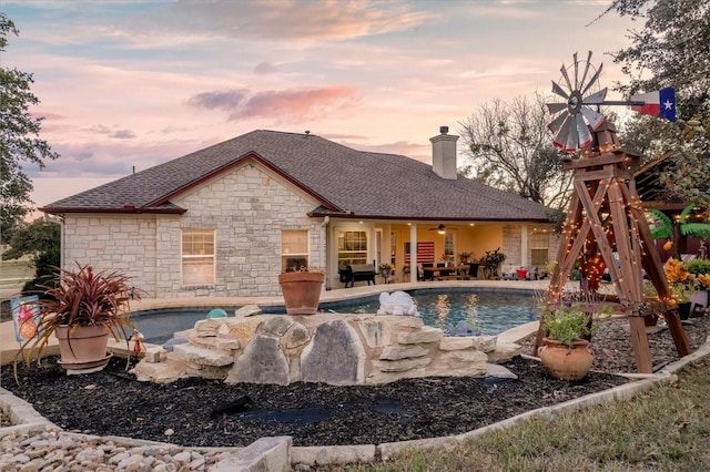 exterior space featuring ceiling fan and a patio area