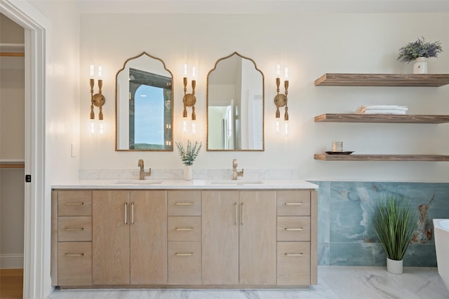 bathroom with a bathing tub and vanity