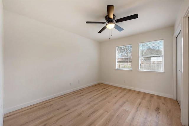 unfurnished room featuring ceiling fan and light hardwood / wood-style floors