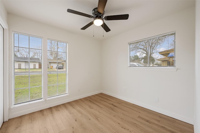 unfurnished room with light hardwood / wood-style floors and ceiling fan