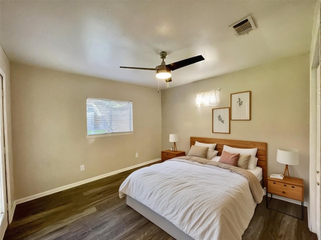 bedroom featuring dark wood-type flooring and ceiling fan