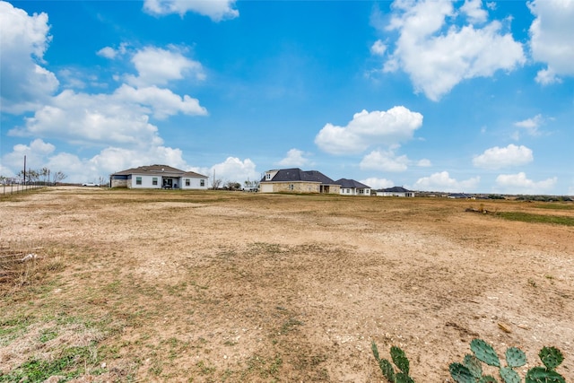 view of yard featuring a rural view