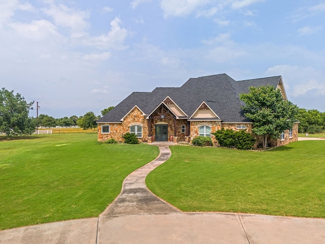 view of front of home featuring a front lawn