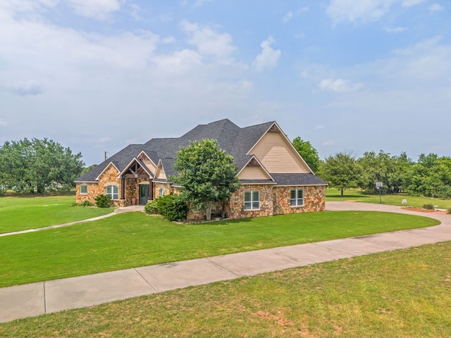 craftsman inspired home with a front yard