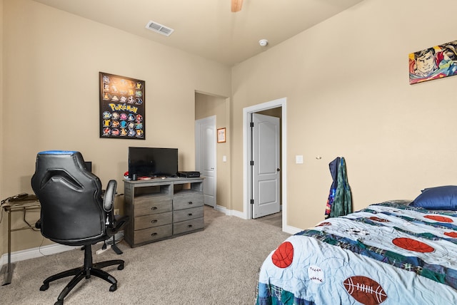 bedroom featuring ceiling fan and light colored carpet