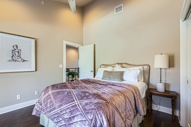 bedroom featuring dark hardwood / wood-style floors