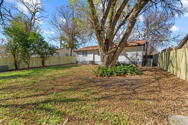 view of yard with central AC