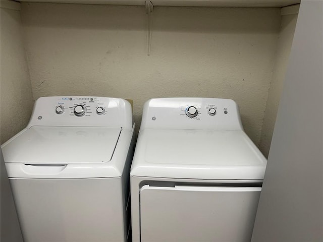 8200 Neely Dr Unit 117, Austin, TX 78759 - washroom featuring independent washer and dryer