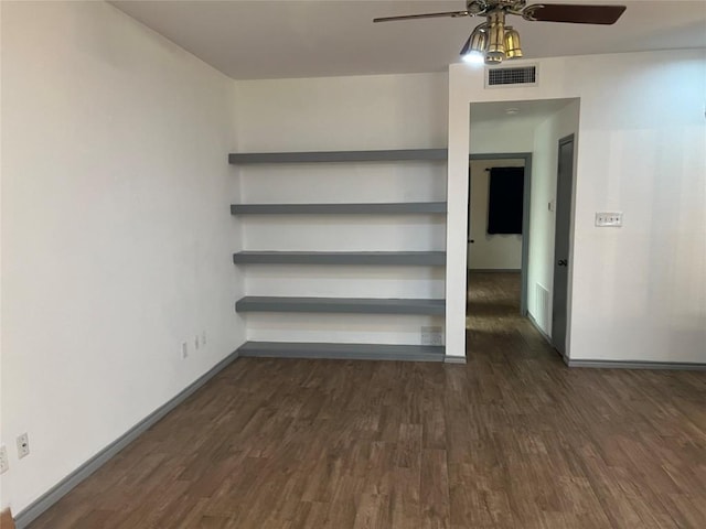 8200 Neely Dr Unit 117, Austin, TX 78759 - spare room featuring ceiling fan, dark wood finished floors, and baseboards