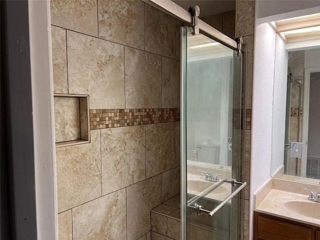 8200 Neely Dr Unit 117, Austin, TX 78759 - bathroom featuring vanity and tiled shower