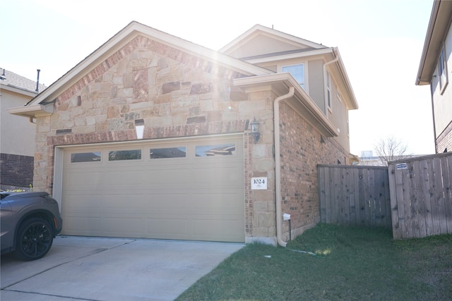 view of side of property featuring a garage