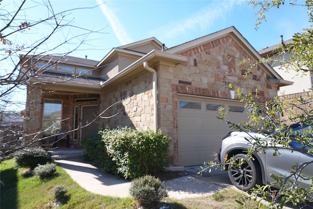 view of side of property with a garage