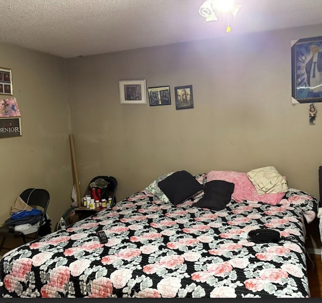 bedroom with a textured ceiling